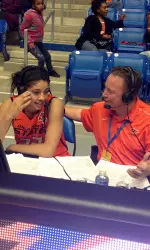 Brittney Martin visits with Casey Kendrick after recording the program's first-ever triple-double.