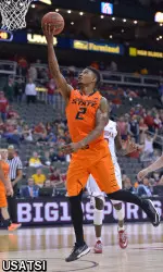 Le'Bryan Nash shoots a layup in the game against the Oklahoma Sooners.
