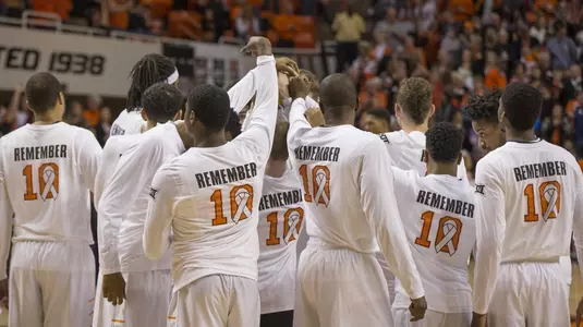 Remember The Ten huddle