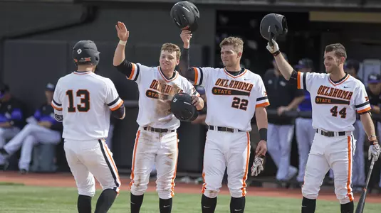 High fives after Littell home run