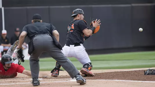 Play at plate vs. Texas Tech