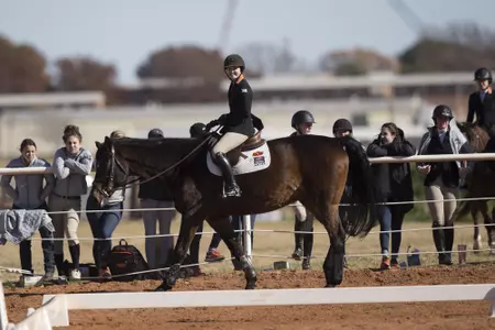 Image Taken at the Oklahoma State Cowgirls vs Texas A&M Aggies Equestrian Match, Sunday, November 19, 2017, Totusek Arena, Stillwater, OK.  Bruce Waterfield/OSU Athletics