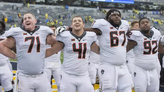 Image Taken at the West Virginia Mountaineers vs Oklahoma State Cowboys Football Game, Saturday, September 28, Milan Puskar Stadium, Morgantown, WV. Bruce Waterfield/OSU Athletics