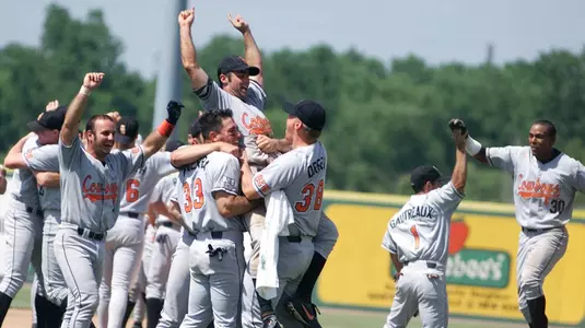 Oklahoma State infielder Billy Gasparino is lifted by teammates Chris Becerra (33) and Thom Dreier (38) after the team defeated Baylor 6-2 to win the NCAA Super Regionals in Waco, Texas, Sunday, June 6, 1999.  Also celebrating are Carlos Gautreaux (1) and Lamont Matthews (30). (AP Photo/Waco Tribune Herald, Rod Aydelotte)