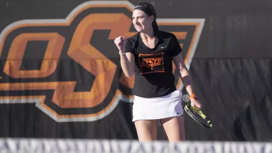 Image Taken at the Oklahoma State Cowgirls vs Kansas Jayhawks Tennis Match, Friday, March 15, 2019, Greenwood Tennis Center, Stillwater, OK. Bruce Waterfield/OSU Athletics