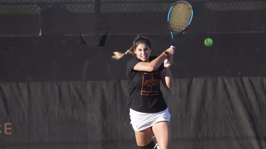 Image Taken at the Oklahoma State Cowgirls vs Kansas Jayhawks Tennis Match, Friday, March 15, 2019, Greenwood Tennis Center, Stillwater, OK. Bruce Waterfield/OSU Athletics
