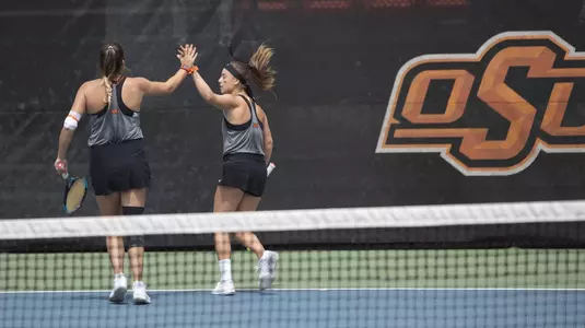 Image Taken at the Oklahoma State Cowgirls vs Oklahoma Sooners Tennis Match, Sunday April 7, 2019, Greenwood Tennis Center, Stillwater, OK. Caulen Spencer/OSU Athletics