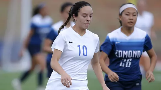 Choctaw's Rebekah George dribble up field as Edmond North's Cindy Rodgers defends during a high school girls soccer game between Edmond North and Choctaw at Choctaw High School in Choctaw, Okla., Tuesday, April 17, 2018. Photo by Sarah Phipps, The Oklahoman