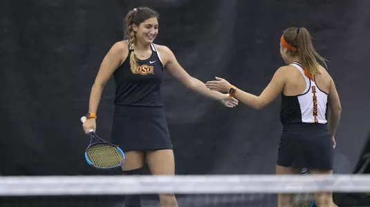 Image Taken at the 2019 Women's NCAA Tennis Championship, Oklahoma State Cowgirls vs University of Central Arkansas Bears Tennis Match, Friday, May 3, 2019, Greenwood Tennis Center, Stillwater, OK. Bruce Waterfield/OSU Athletics