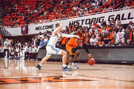 Issac Likekele drives to the basket