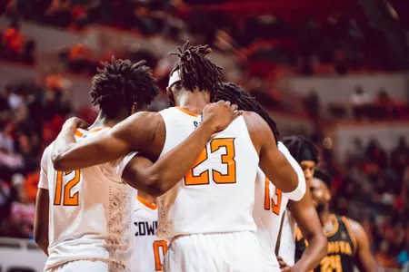 Cowboys huddle during break in action