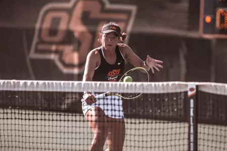 Image Taken at the 2022 NCAA Women's Tennis Championships, Oklahoma State Cowgirls vs New Mexico State Aggies, Saturday, May 7, 2022, Greenwood Tennis Center, Stillwater, OK. Bruce Waterfield/OSU Athletics