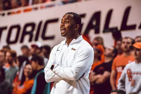 Mike Boynton coaches during Kansas State game