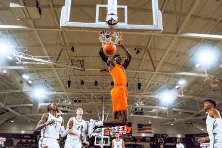 Moussa Cisse dunking against Oakland