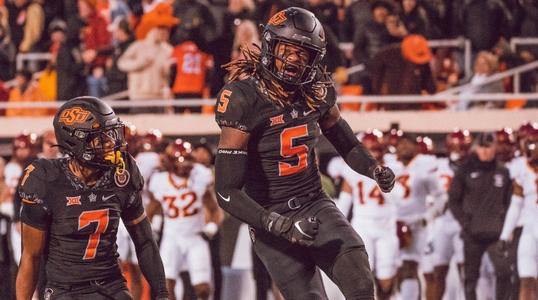 resize?url=https%3A%2F%2Fdxbhsrqyrr690.cloudfront.net%2Fsidearm.nextgen.sites%2Fokstate.com%2Fimages%2F2022%2F11%2F14%2F221112_Football_vs__ISU__09_large_XxuA9.jpg&height=300