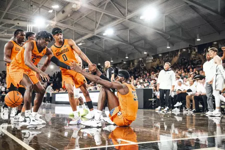 Image Taken at the Oklahoma State Cowboys at Oakland Golden Grizzlies Basketball Game, Sunday, November 13, 2022, Athletics Center O'Rena, Rochester, MI. Mary Elizabeth/OSU Athletics