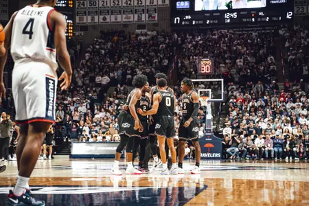 Image Taken at the Oklahoma State Cowboys at UConn Huskies for Big 12 Big East Battle, Thursday, December 1, 2022, Harry A. Gampel Pavilion, Storrs, CT. Mary Elizabeth/OSU Athletics