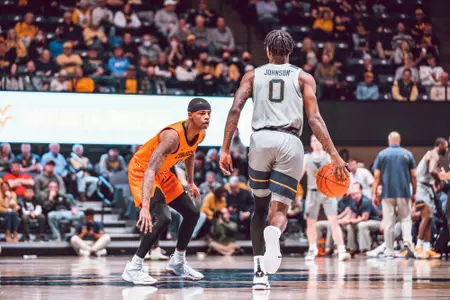 Avery Anderson Guards WVU Player