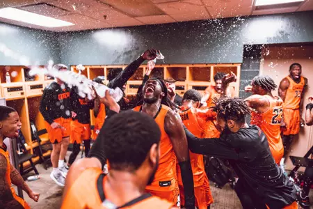 Isaac Likekele celebrates with teammates