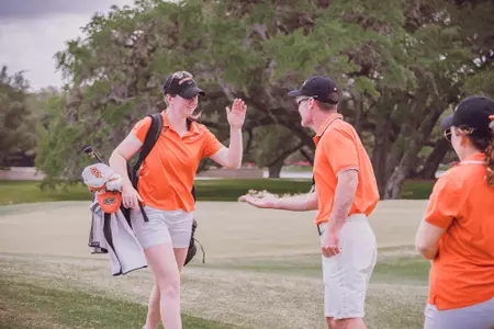 Lianna Bailey High Fives Head Coach Greg Robertson