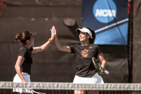 Image Taken at the 2022 NCAA Women's Tennis Championships, Oklahoma State Cowgirls vs New Mexico State Aggies, Saturday, May 7, 2022, Greenwood Tennis Center, Stillwater, OK. Bruce Waterfield/OSU Athletics