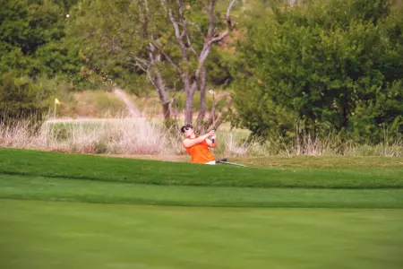 Hailey Jones hits ball out of bunker in Norman