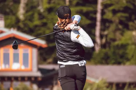 Cecilie Leth-Nissen hits ball at Pebble Beach