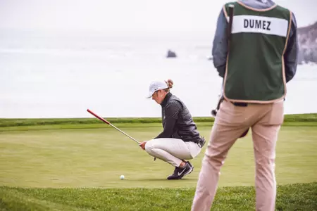 Maddison Hinson-Tolchard lines up putt at Pebble Beach