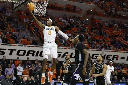 Caleb Asberry Goes For Layup Against Kansas State