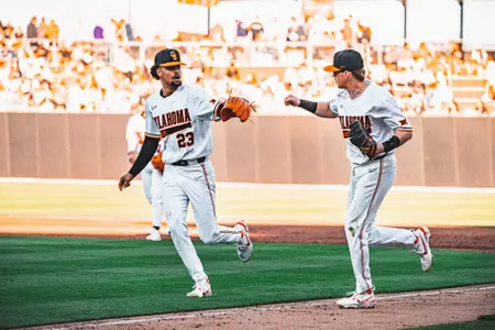 Watts-Brown and Mendham fist bump vs. Austin Peay