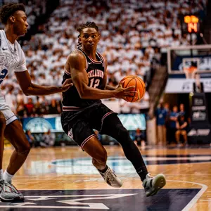 Javon Small drives to the BYU basket