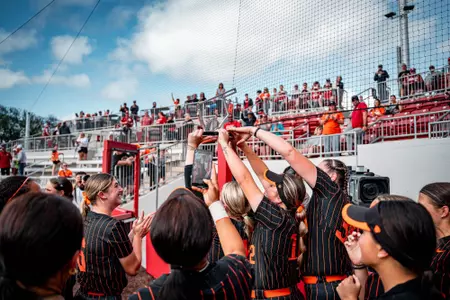 Cowgirl Softball Lifting Bedlam Trophy