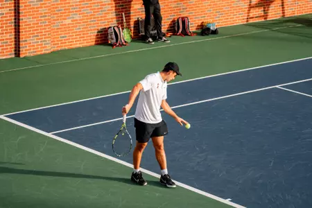 Cowboy Tennis Splits Doubleheader in Seattle