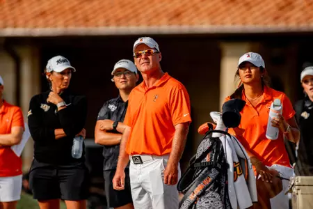 2025 Big 12 Championship Greg Robertson and Summer Lee