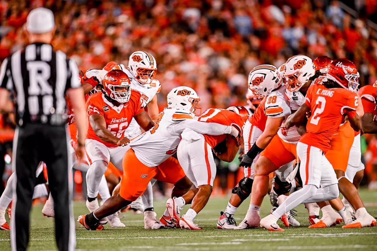 Oklahoma State defensive lineman Braylon Rigsby makes a tackle at the line of scrimmage during the Cowboys' game against Houston on October 17, 2026 at TDECU Field.