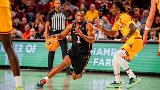 Clary driving to the basket