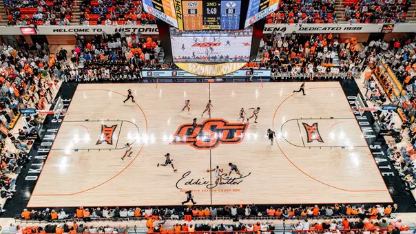 Wide shot of game action on Eddie Sutton Court