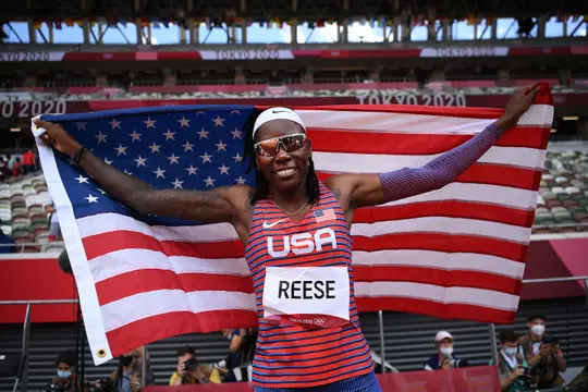 TOKYO, JAPAN - AUGUST 03: Brittney Reese of Team United States celebrates winning the silver medal in the Women's Long Jump Final on day eleven of the Tokyo 2020 Olympic Games at Olympic Stadium on August 03, 2021 in Tokyo, Japan. (Photo by Matthias Hangst/Getty Images)
