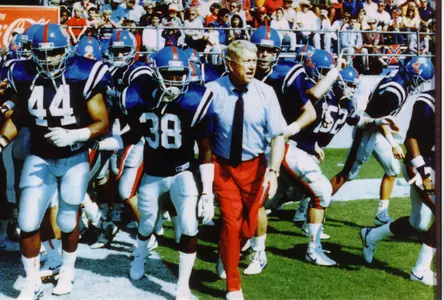 Chucky Mullins with then head coach Billy Brewer
