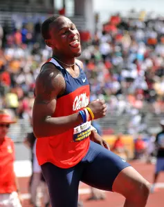 Ricky Robertson celebrates his record jump (photo by Jake McDonald)