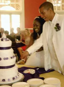 Bride and groom cutting their cake