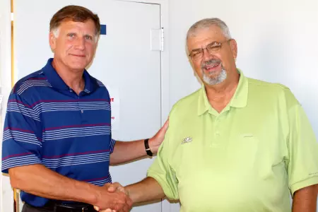 Athletics Director Pete Boone with Chief Calvin Sellers