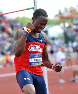 Ricky Robertson celebrates his record jump at the SEC Championships (photo by Jake McDonald)