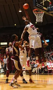 Reginald Buckner throws down a huge slam (photo by Robert Jordan)