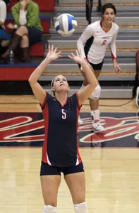 Ashley Veach had her first double-double with 23 digs and a career-high 11 assists on senior night.