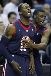 Murphy Holloway and Reginald Buckner celebrate (AP photo)
