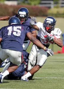 With injuries slowing junior Jeff Scott, the running back position battle has tightened up, head coach Hugh Freeze said.