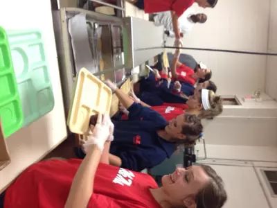 Rachael McLamore, far right, and the Ole Miss volleyball team volunteered its time at a drug and alcohol recovery program in Cincinnati, Ohio.