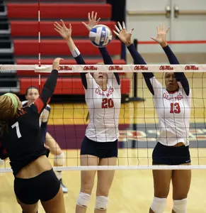 Sophomore Nakeyta Clair, right, has a single-season program record 98 block assists this season.