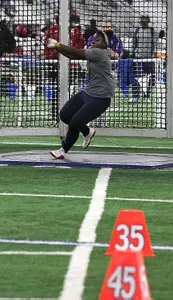 Jazmin Miller placed fifth in the weight throw on Sunday. (photo by Joshua McCoy)